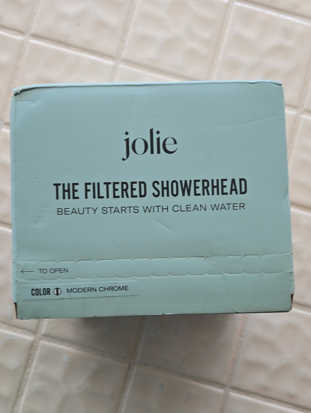 Brand NEW UNOPENED Jolie Filtered Showerhead - Light Teal Packaging